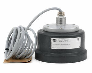 Industrial load cell with a coiled gray cable and metal top connector
