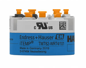 Endress+Hauser iTEMP temperature transmitter module with orange terminal connectors and blue label reading Made in Germany 2019 D-87484 Nessellwang.
