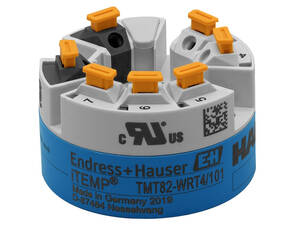 Circular multi-terminal connector with orange top clamps on a blue base; Endress+Hauser iTEMP TMT82-WRT4/101 (Made in Germany 2019).