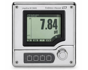 Benchtop pH meter with a large digital display reading 7.84 pH, a metallic case, four control buttons, and a round adjustment knob.